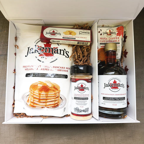 Open maple breakfast gift box with pancake mix, maple coffee, and syrup bottle