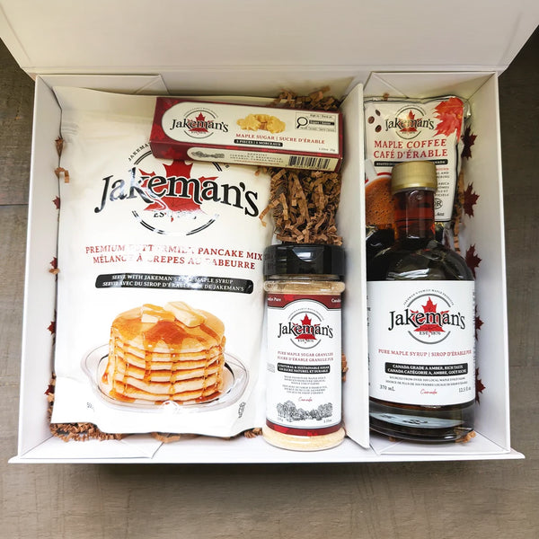 Open maple breakfast gift box with pancake mix, maple coffee, and syrup bottle