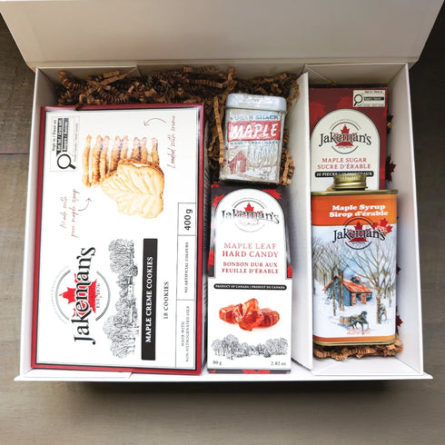Jakeman’s maple traditions gift box with cookies, hard candy, and syrup containers