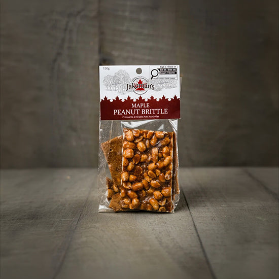 Maple peanut brittle sweets in sealed clear snack bag with white label