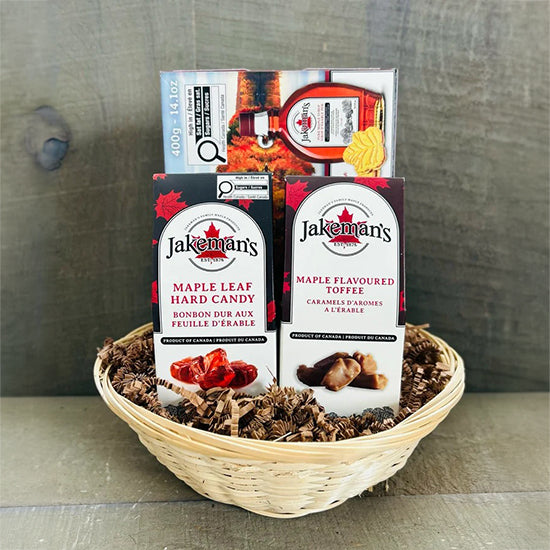 Gift basket with woven wicker tray and Jakeman's maple candy packages